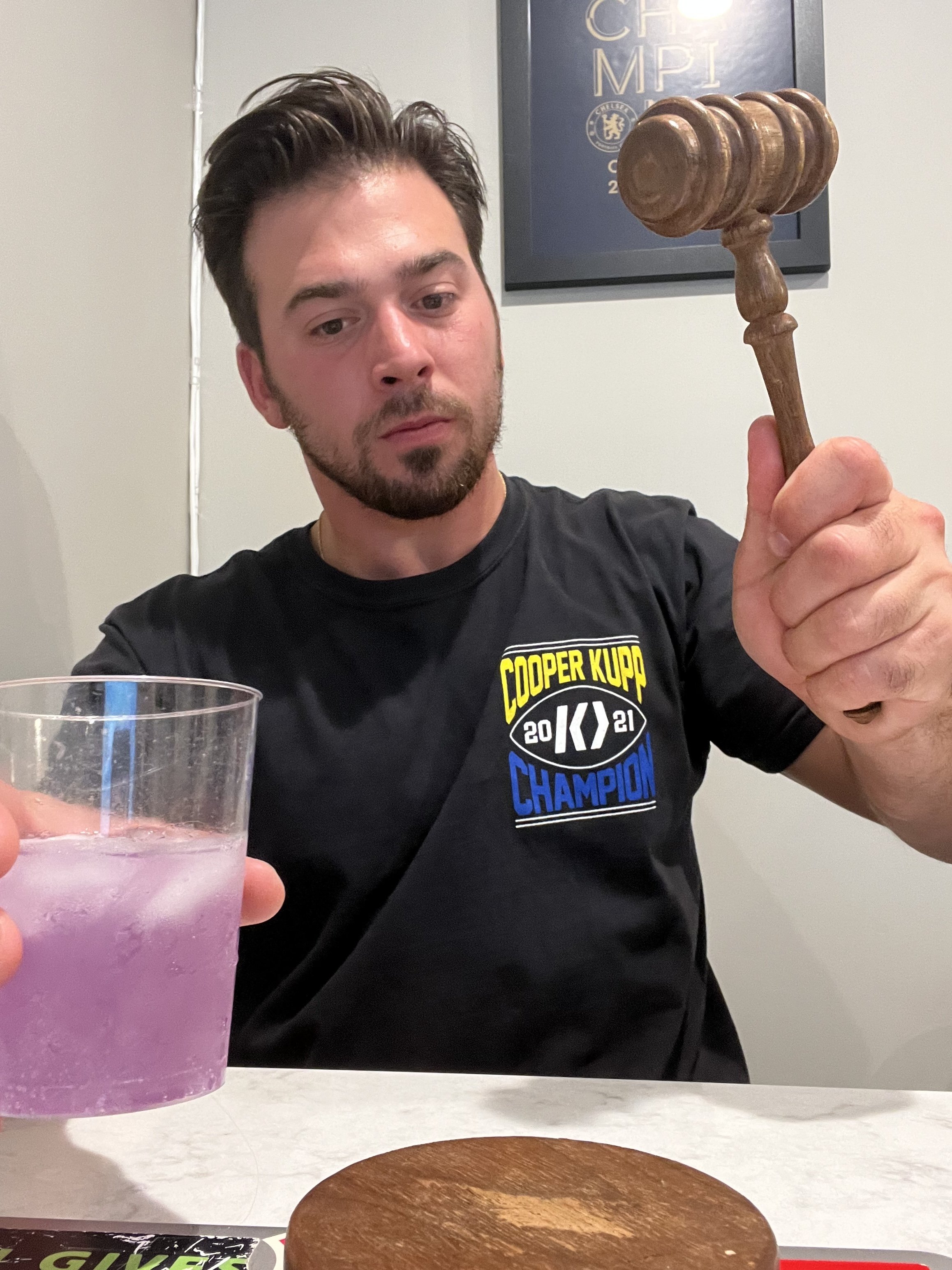 Adam holding a gavel